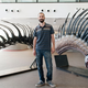 Lead author Pablo Gallina posing with the new reconstructions.
